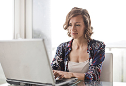 Patient in a video consultation on a laptop