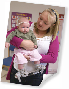 Photo of Baby Cali-Ann wearing the boots and bar.  Click for photogallery and full description of each photo 