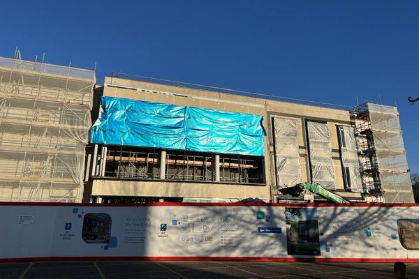 Dyson Cancer Centre with windows and glass doors being installed