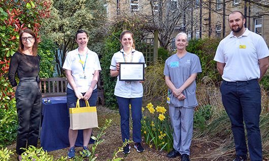 The Outpatient Musculoskeletal and Pelvic Health Service with Chief Executive, Cara Charles-Barks, at the award presentation