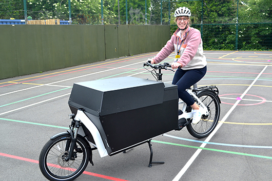 Annelore Hill-Verhaegen on one of our new e-cargo bikes