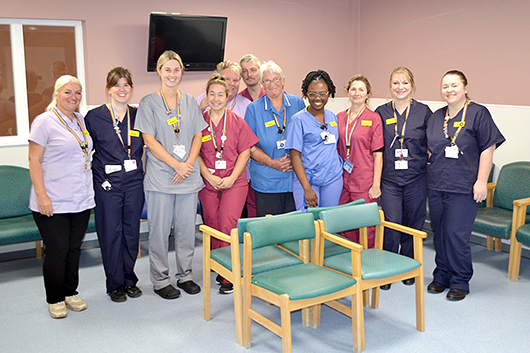 Day Surgery Unit staff posing for the camera in the new waiting room