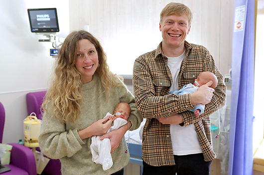 Parents Faye and Ryan with their identical twins Conall and Murray