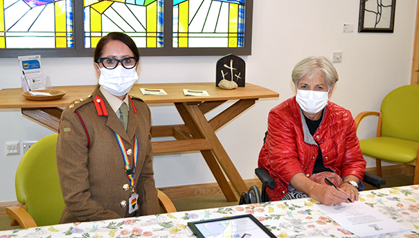 Chief Executive Cara Charles-Barks signing the Military Covenant